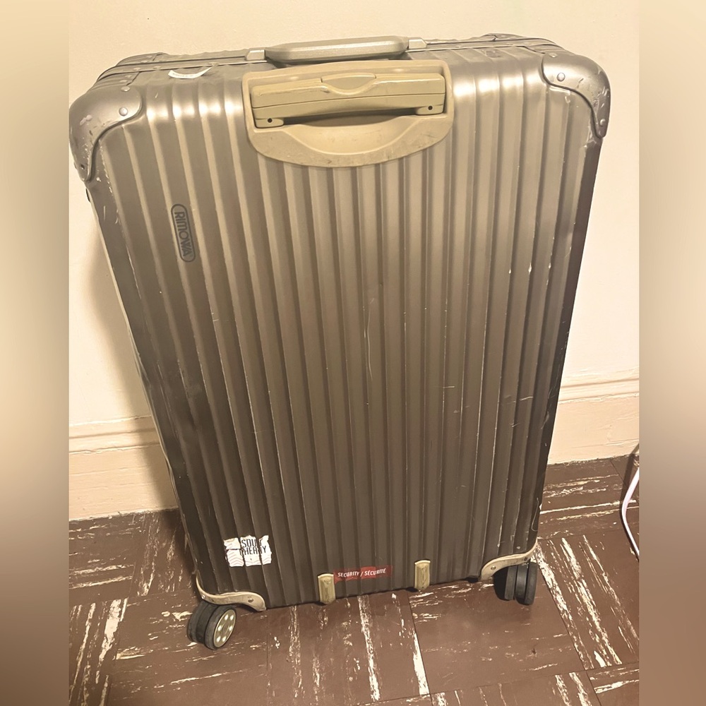 Rimowa Titanium Gold 4-wheels check in case